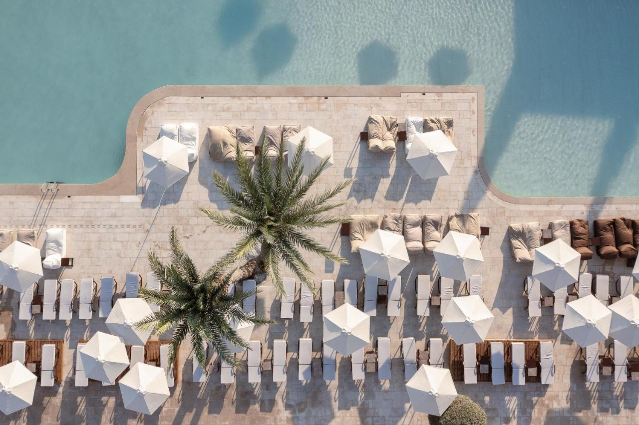 Helea Lifestyle Beach Resort Kallithea  Bagian luar foto Aerial view of the pool at the Westin Dubai