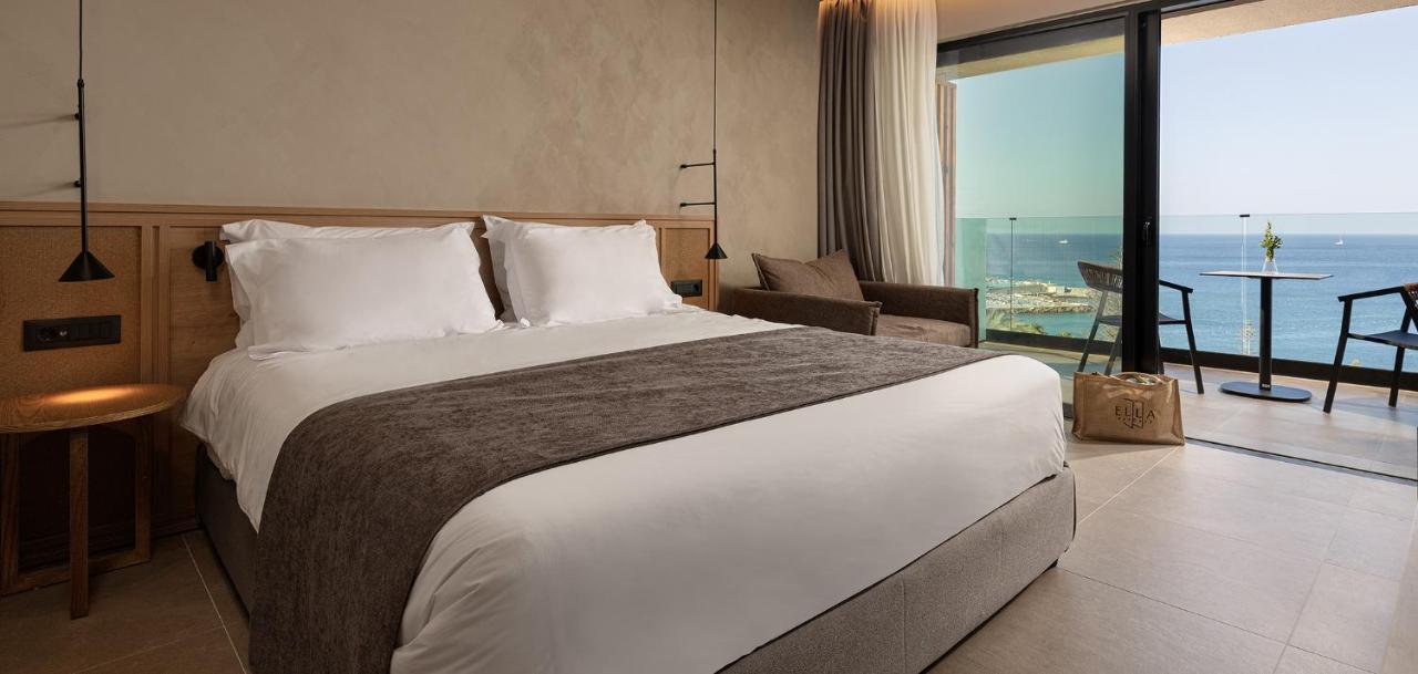Helea Lifestyle Beach Resort Kallithea  Bagian luar foto A bedroom at the hotel