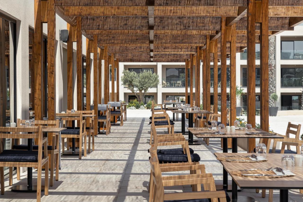 Helea Lifestyle Beach Resort Kallithea  Bagian luar foto The restaurant at the hotel