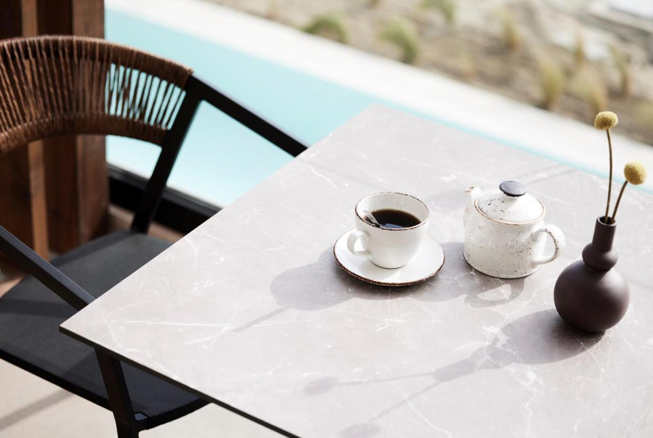 Helea Lifestyle Beach Resort Kallithea  Bagian luar foto A table with a porcelain tabletop
