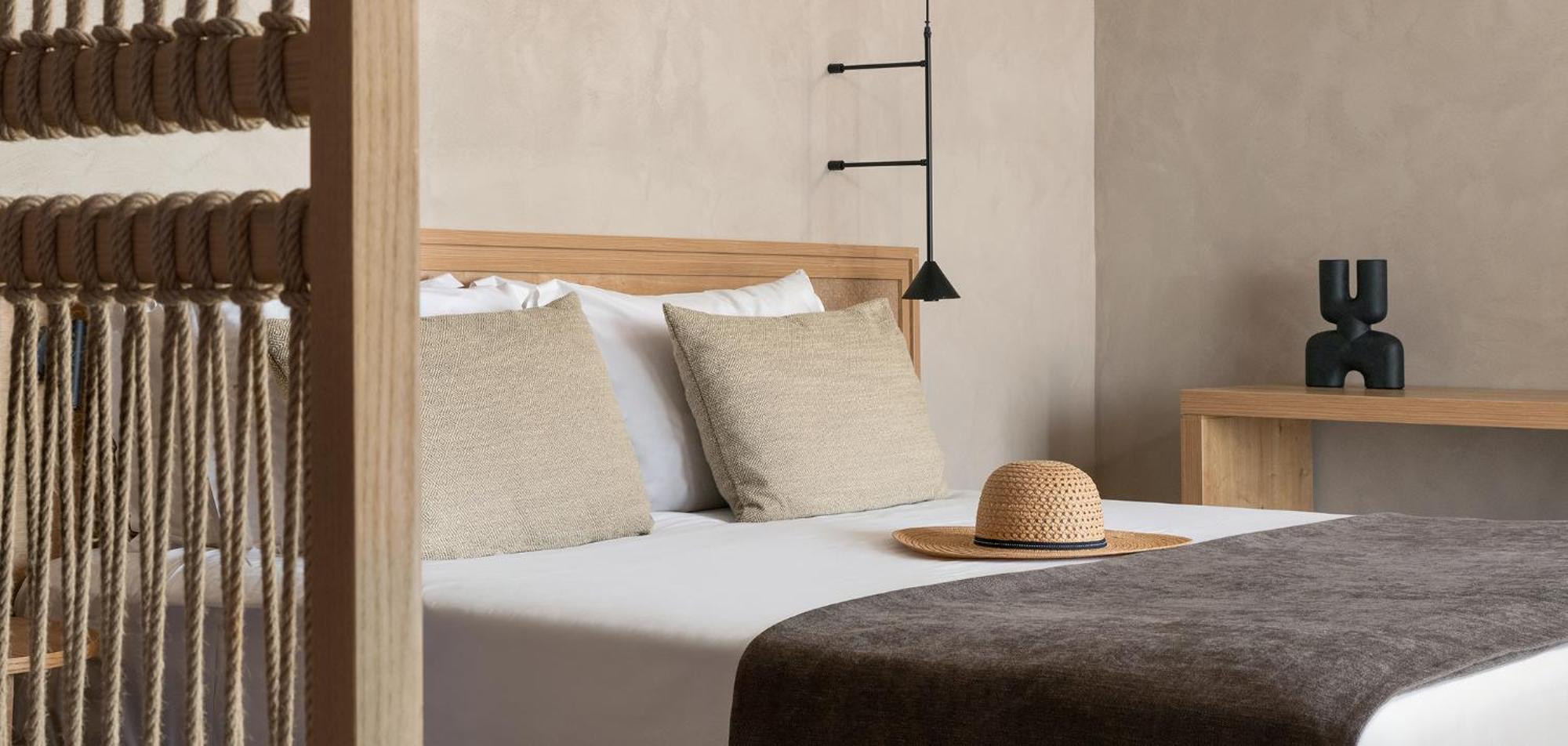 Helea Lifestyle Beach Resort Kallithea  Bagian luar foto A bed with a straw hat
