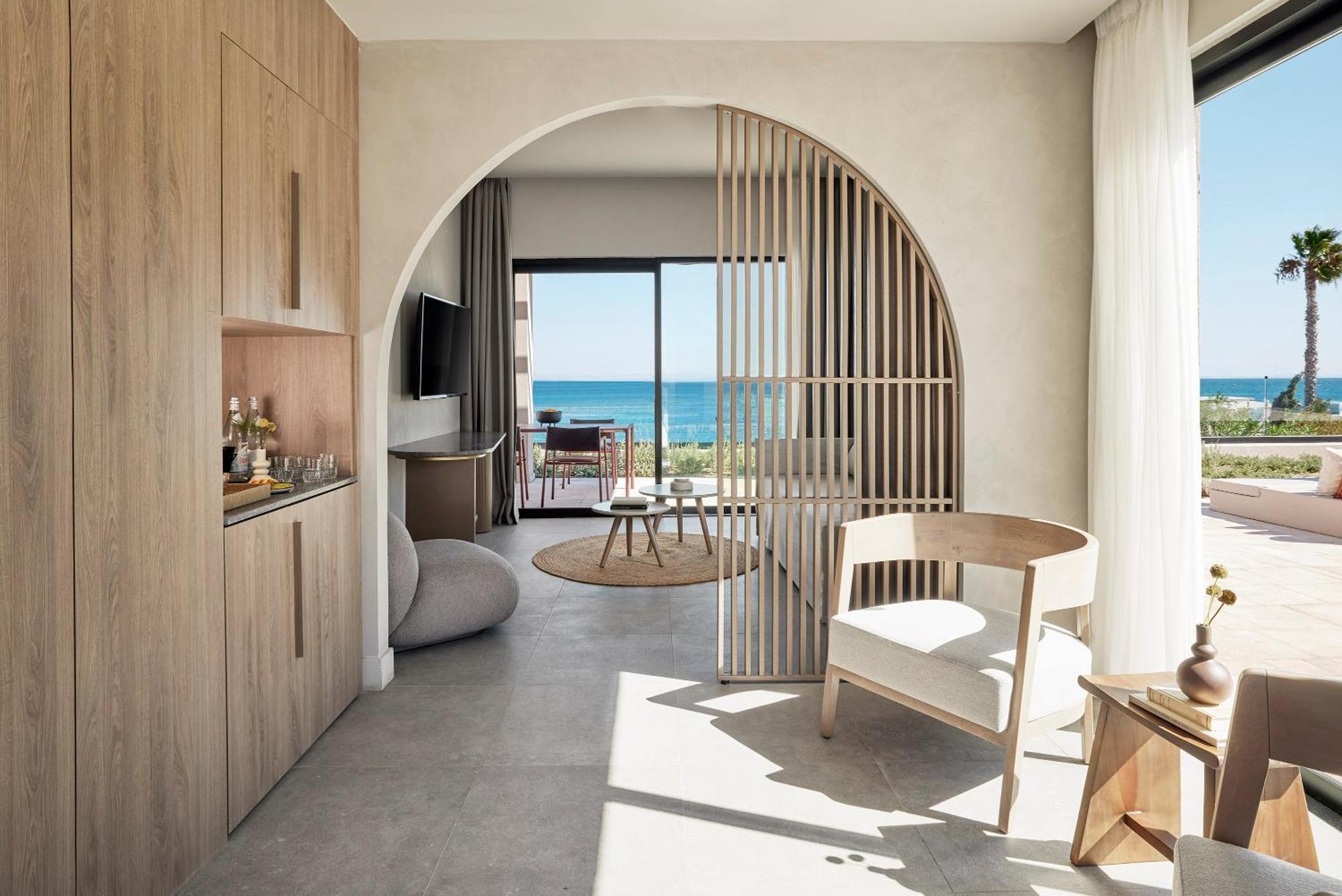 Helea Lifestyle Beach Resort Kallithea  Ruang foto Interior of a suite at the hotel